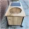 zijaanzicht bbq tafel james van eikenhout met boomblad